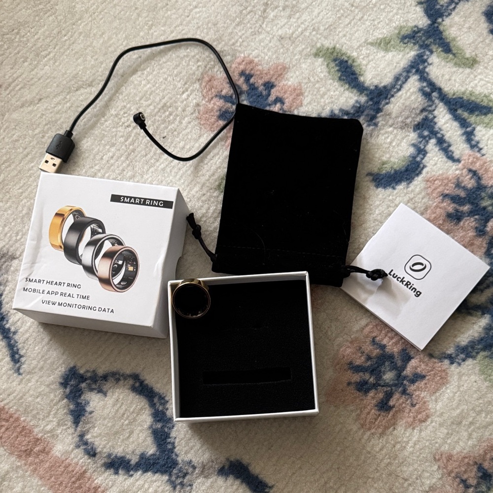 Gold and Black Smart Ring with Accessories